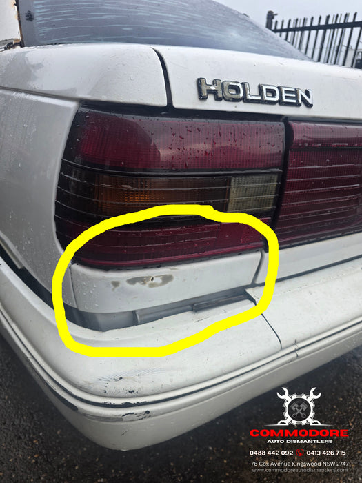 A292 - VP Holden Commodore SEDAN - Rear Lower Quarter Body Trim - PASSENGERS SIDE - ALASKAN WHITE #J064