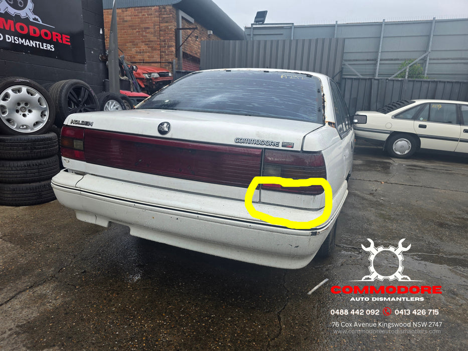 A292 - VP Holden Commodore SEDAN - Rear Lower Quarter Body Trim - DRIVERS SIDE - ALASKAN WHITE #J064