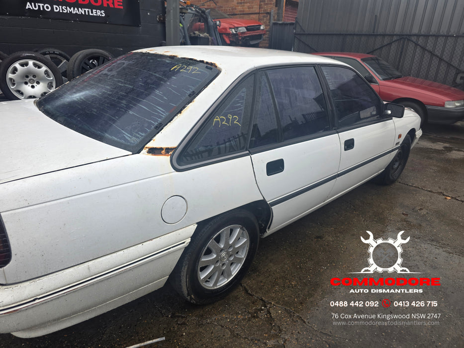 A292 - VP Holden Commodore SEDAN - Fuel Flap - ALASKIN WHITE #J064