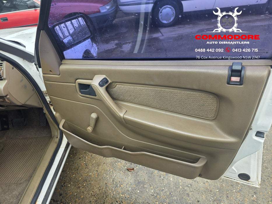 A292 - VP Holden Commodore SEDAN - Door Drivers Front - ALASKIN WHITE #J064 MANUAL WINDOW REG
