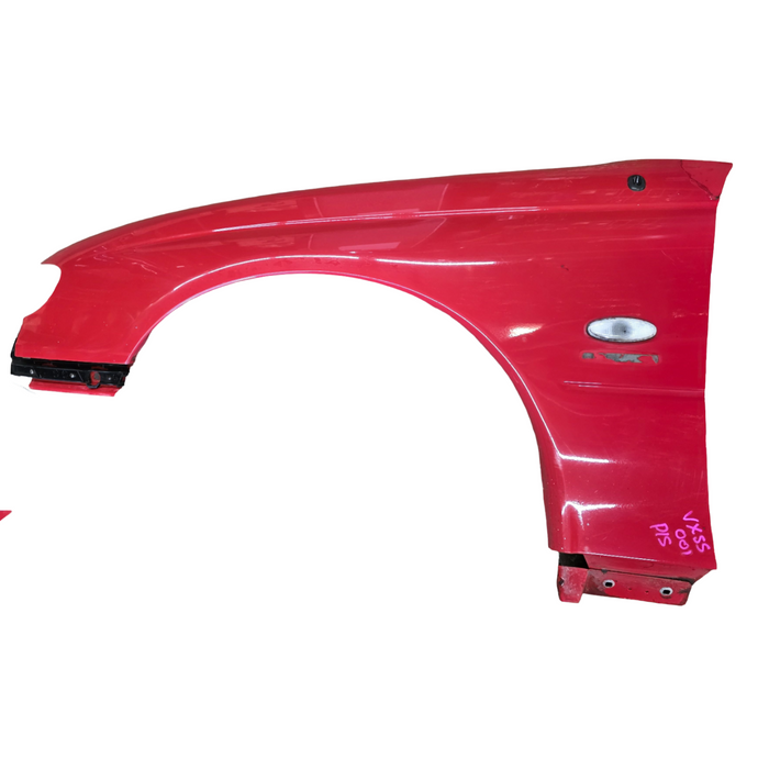 VXSS001 - VX SS HOLDEN COMMODORE - Passengers Front Guard w/ Guard Blinker - STING RED #687F