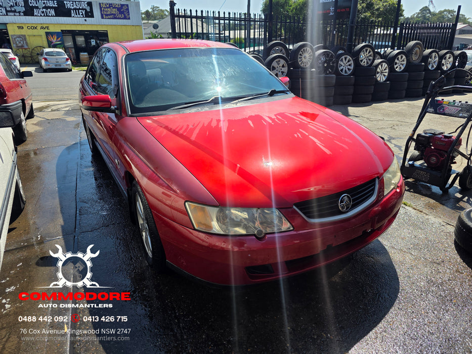 A302 - VY Holden Commodore Sedan - Rear Bar diffuser with towbar cover GENUINE