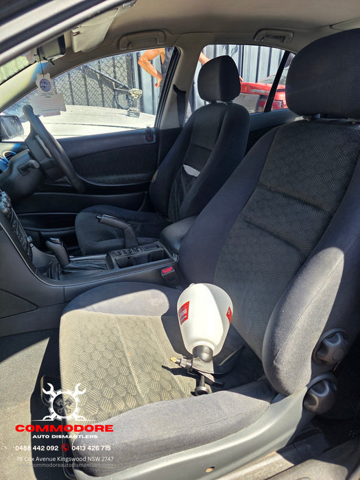 A302 - VY Holden Commodore Sedan - Front Seats (PAIR) Cloth with Stalks and Seat rails.