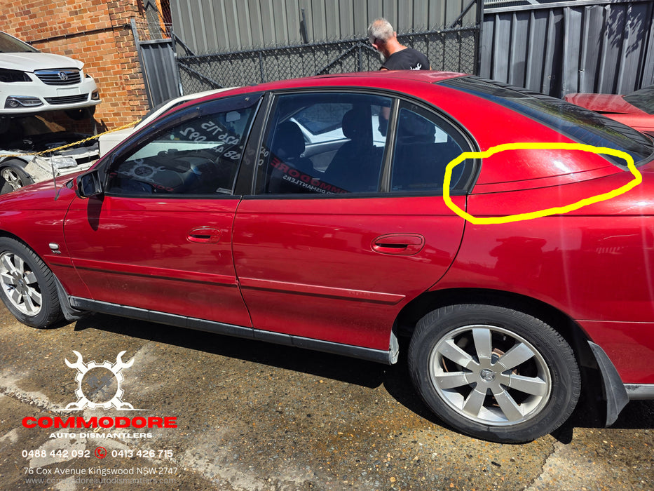 A302 - VY Holden Commodore Sedan - Rear Quarter Body Trim Passenger's Side - SHANGHAI RED #507G
