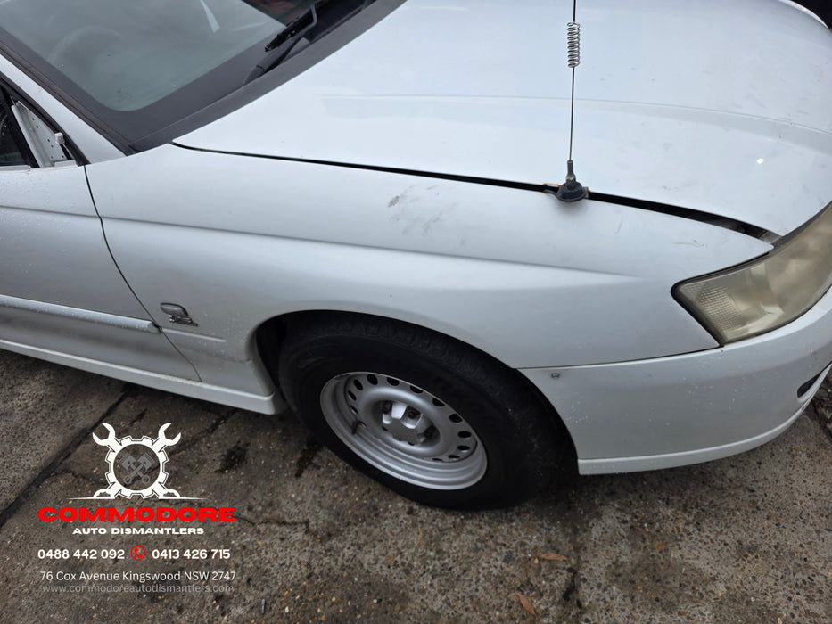 A303 - VZ Holden ONE TONNER Utility - Front Guard Driver's Side - HERON WHITE #679F