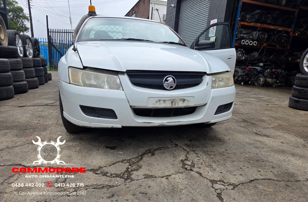 A303 - VZ Holden ONE TONNER Utility - Front Bar with Upper Grille & Fog Light Bezels - HERON WHITE #679F