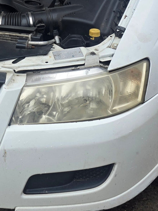A303 - VZ Holden ONE TONNER Utility -  Passenger's Side Headlight GENUINE