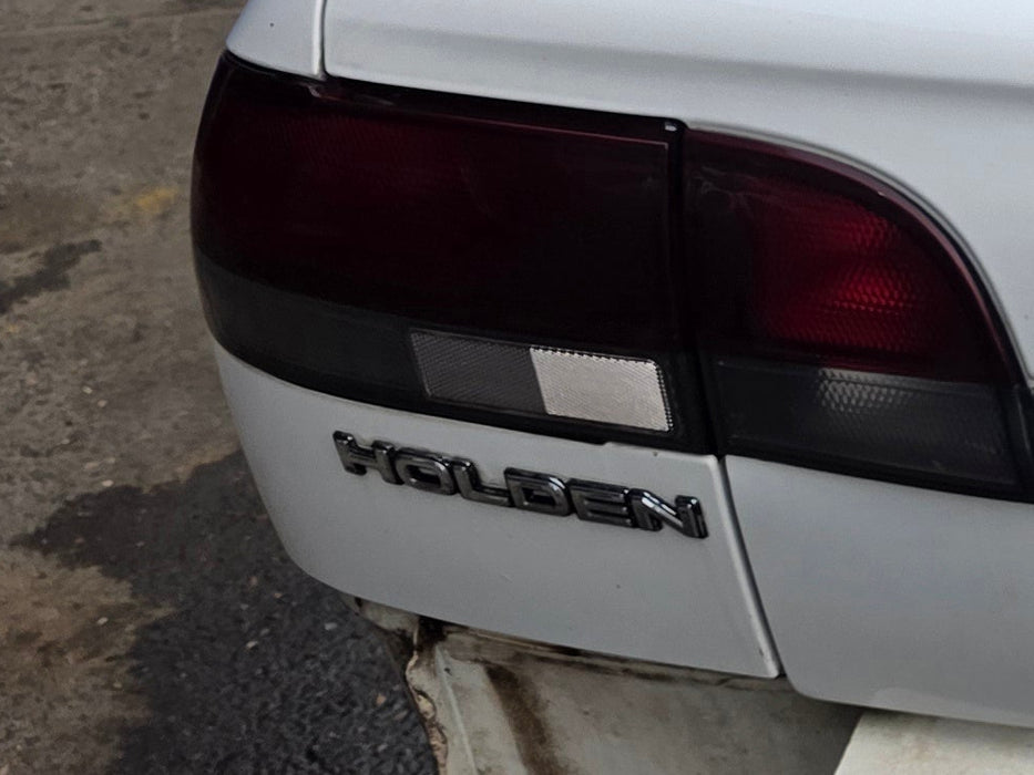 A305 - VR Holden Commodore SEDAN  - "HOLDEN" Rear Bar Badge GENUINE