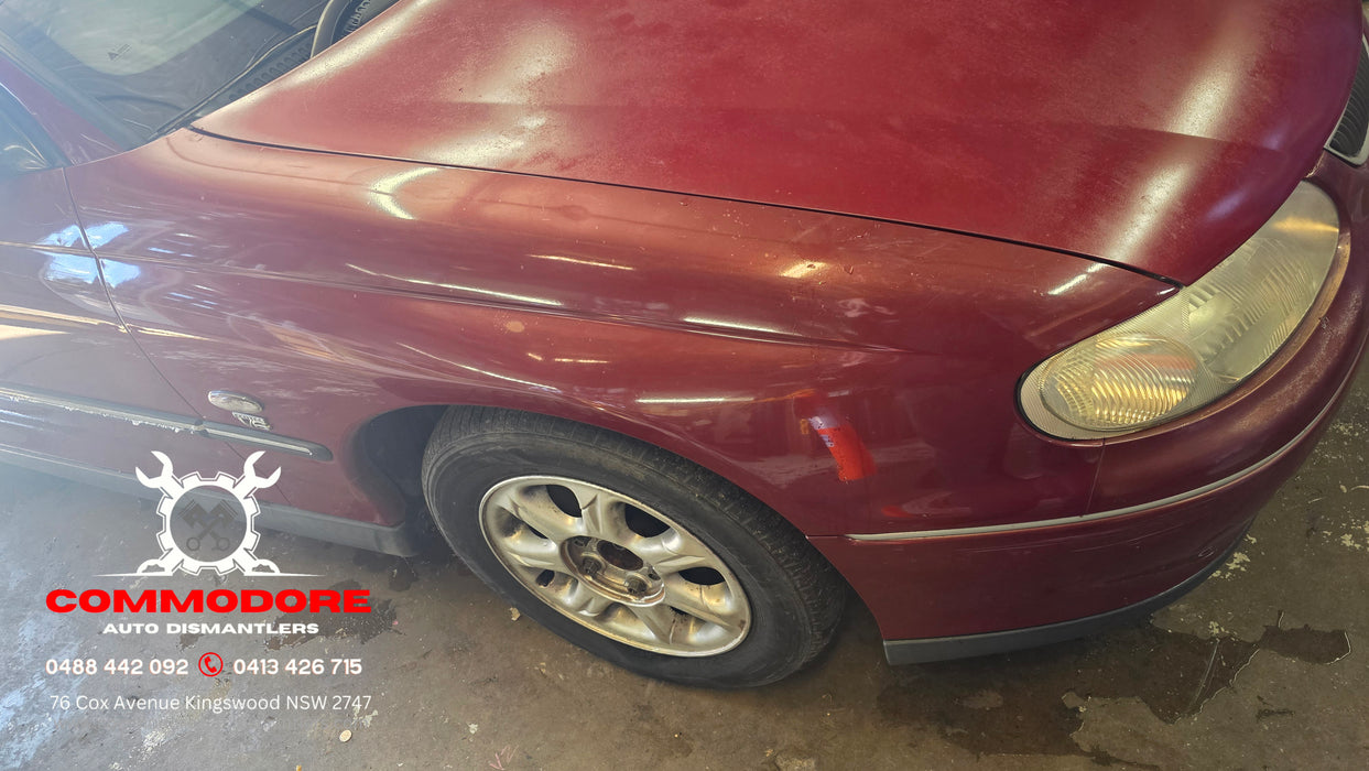 A315 - VT SERIES II Holden Commodore Sedan - Driver's Front Guard w/ "V6" Badge & Guard Blinker - GRANADA RED #F129