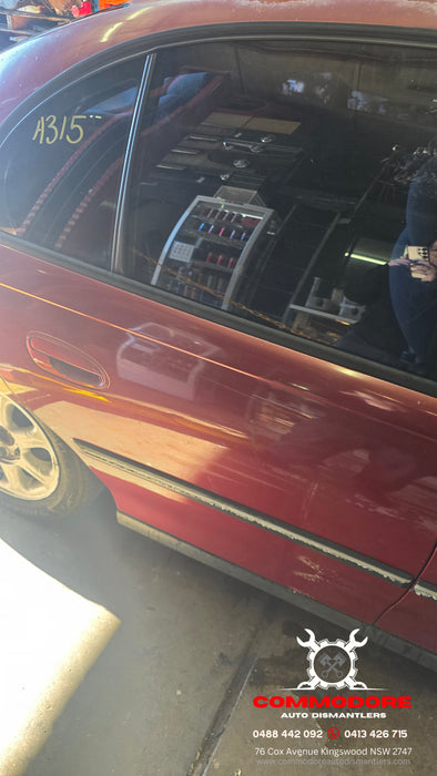 A315 - VT SERIES II Holden Commodore Sedan - Driver's Rear Door (POWER WINDOW) - GRANADA RED #F129