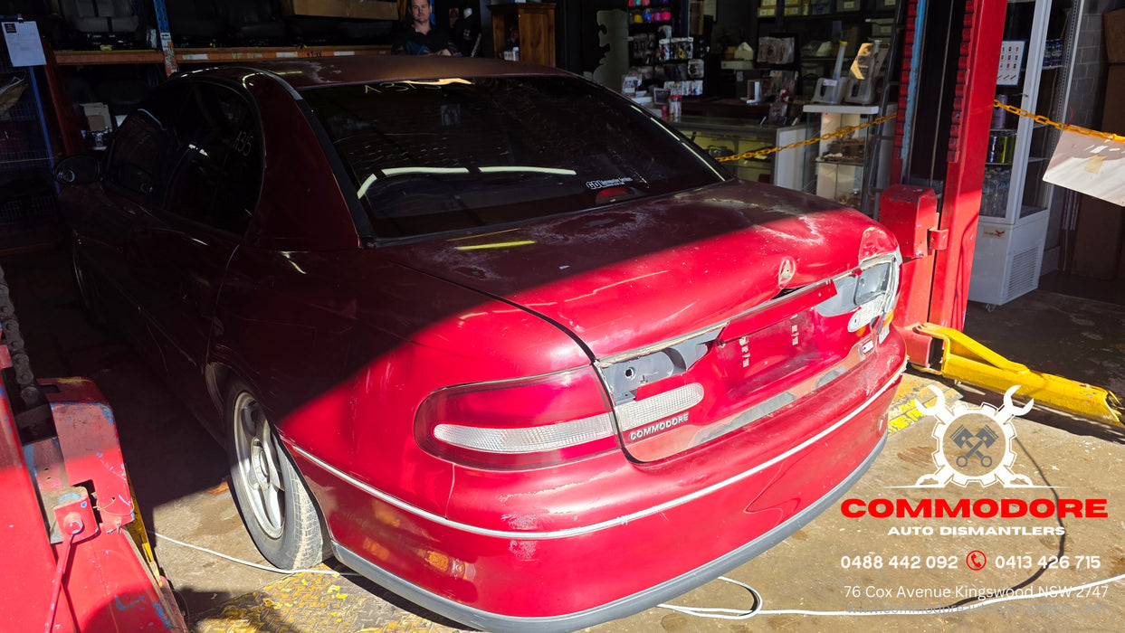 A315 - VT SERIES II Holden Commodore Sedan - Lower Boot Garnish Trim - GRANADA RED #F129