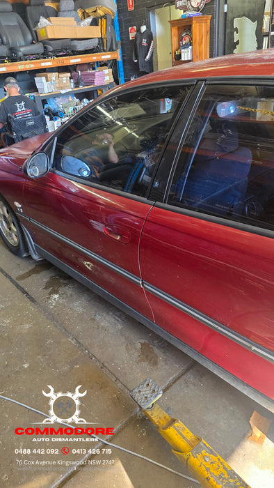 A315 - VT SERIES II Holden Commodore Sedan - Passenger's Front Door (POWER WINDOW) - GRANADA RED #F129
