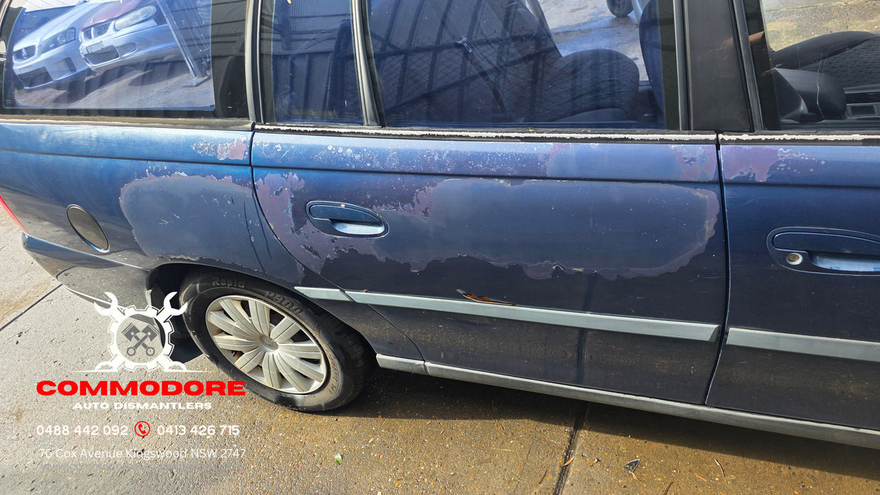 a324 - VY Holden Commodore WAGON Fuel Flap (unpaited)