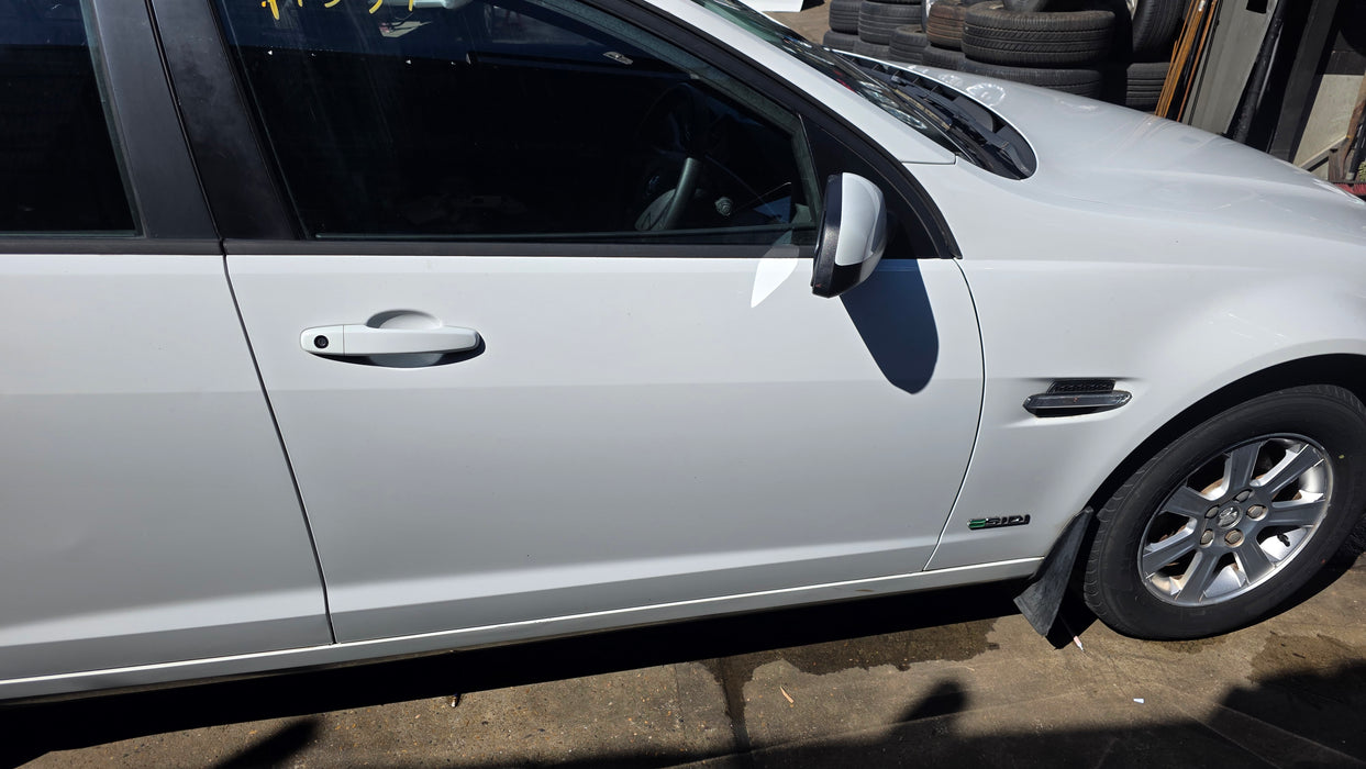 A337 - VE Holden Commodore Omega Wagon V6 LF1, Auto MYB Herron White 283,XXXkms