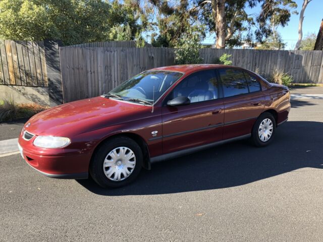 A007 - VT HOLDEN BERLINA - REAR BAR - MAROON