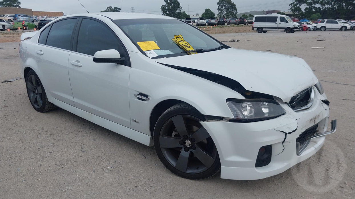 A204 - VE SV6 HOLDEN COMMODORE SERIES II - Fuel Flap HERON WHITE #679F