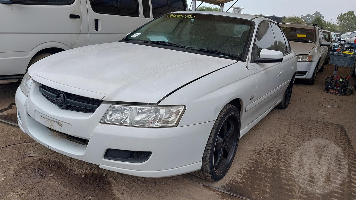 A209 - VZ HOLDEN COMMODORE SEDAN - FUEL FLAP - HERON WHITE #679F