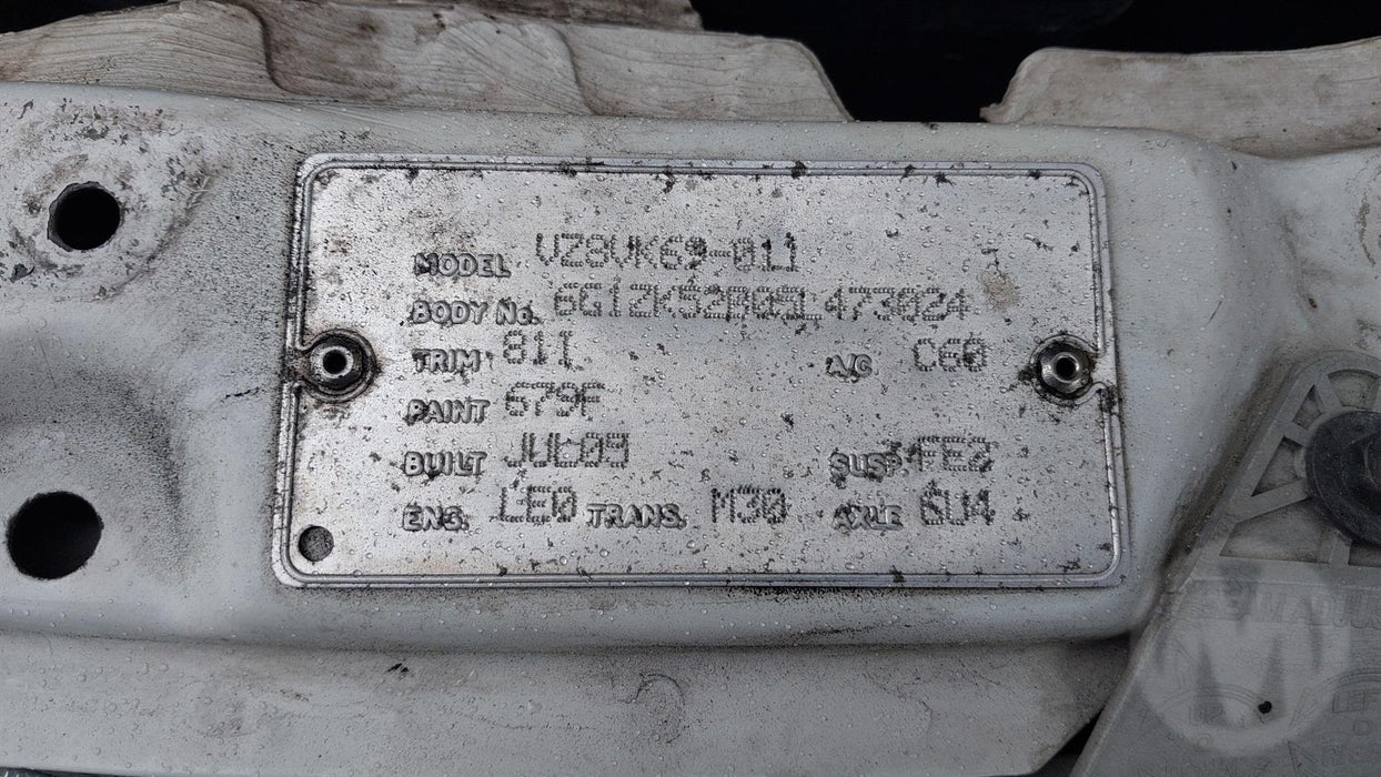 A209 - VZ HOLDEN COMMODORE SEDAN - FUEL FLAP - HERON WHITE #679F