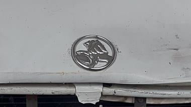 A238 - VX SII Holden Commodore SEDAN - "LION" Bonnet Badge GENUINE - CHROME