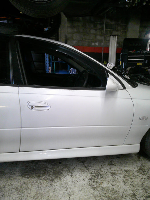 A086 - VX Holden Commodore S-Pac Sedan SI - Sideskirt (PAIR) - HERON WHITE #J073