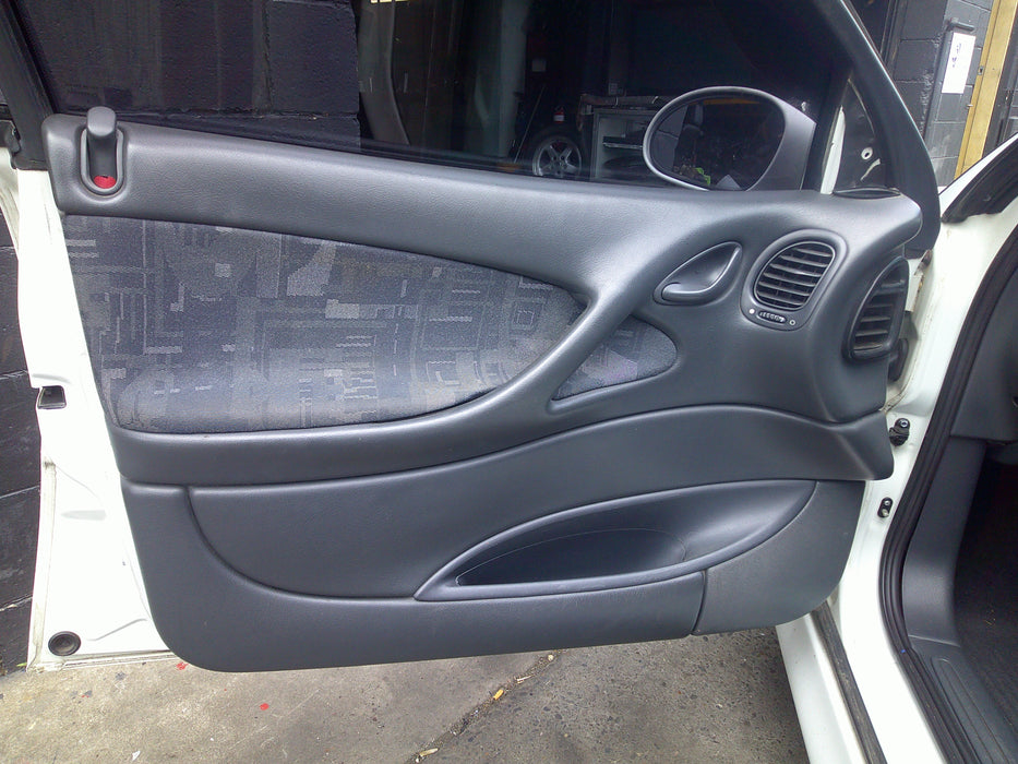 VT / VX Holden Commodore - DRIVER'S SIDE - Kick Panel / Grey Plastic - Part #92078531