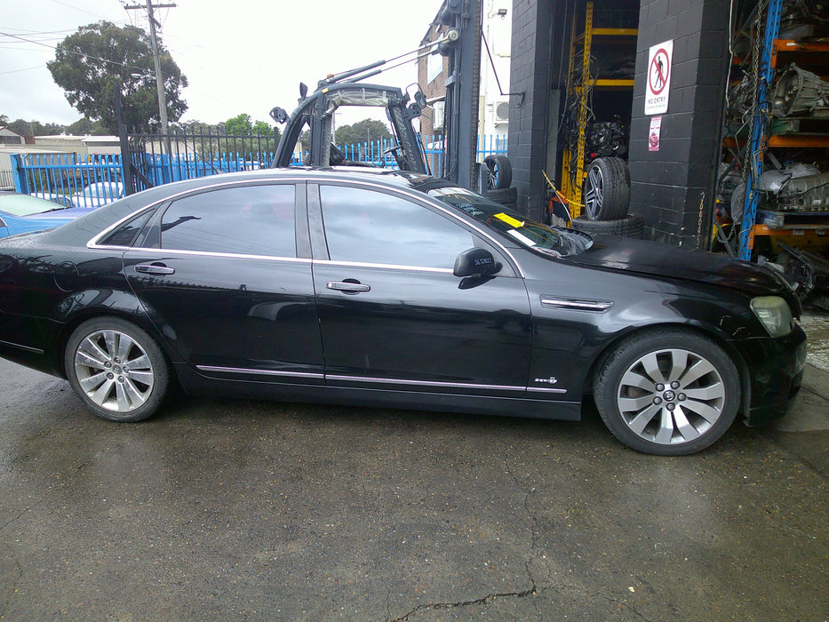 A079 - WM Holden Caprice V - Door Driver's Rear - Phantom Black #690F ith Chrome Trim