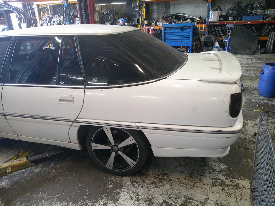 A073 - VQ Statesman Rear QRT Window Passenger Side