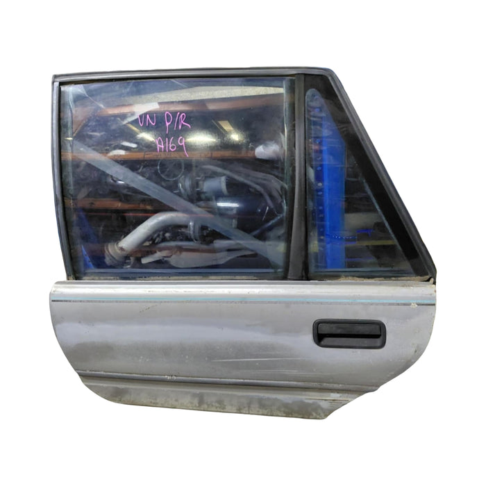 A169 - VN Holden Commodore Sedan - Front Door - Passengers Rear (MANUAL WINDOWS) - Petina ASTROID SILVER #2J013