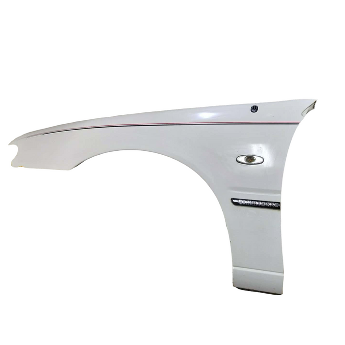 A306 - VR Holden Commodore Sedan - Passenger's Front Guard w/ Antenna Bezzel & Badge - ALASKAN WHITE #J064