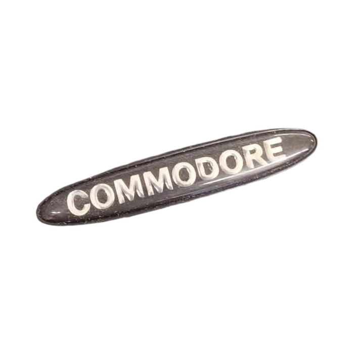 A301 - VT HOLDEN COMMODORE WAGON - "COMMODORE" Dash Badge GENUINE