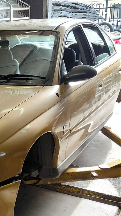 EX004 - VX Holden Commodore Sedan SII - External Door Handle Passenger's Front - HYPER YELLOW #D148