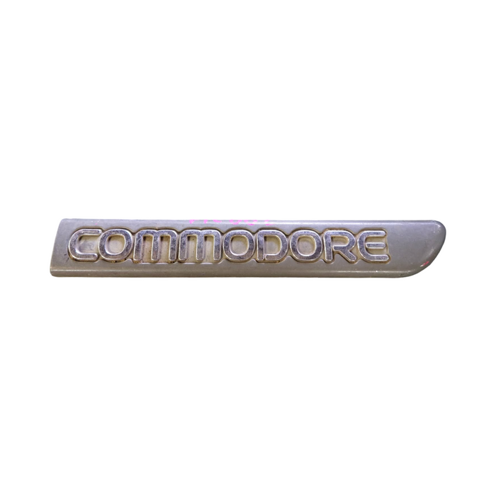 PIC002 - VR/VS Holden Commodore - "COMMODORE" Driver's Front Guard Badge Genuine - GREY/CHROME 165mm