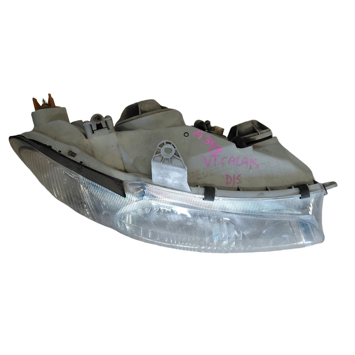 A343 - VT Holden Commodore Calais - Driver's Front Headlight GENUINE