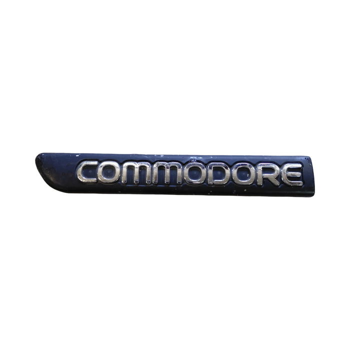 EX015 - VS SI Holden Commodore Sedan - "COMMODORE" Guard Badge Passenger's Side