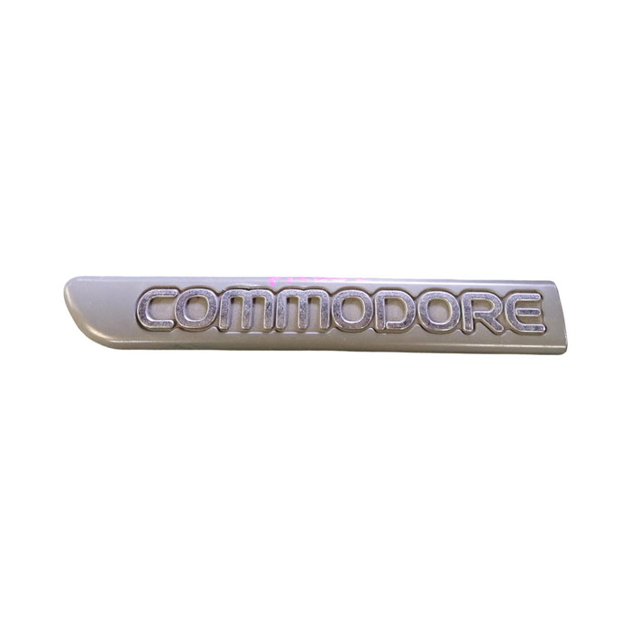 PIC002 - VR/VS Holden Commodore - "COMMODORE" Passenger's Front Guard Badge Genuine - GREY/CHROME 165mm