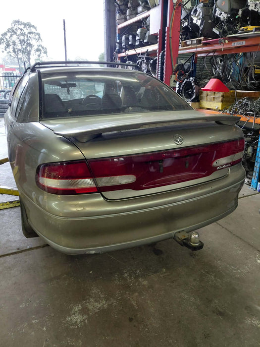 EX003 - VT Holden Calais - Rear Boot Garnish w/ "CALAIS" Chrome Badge