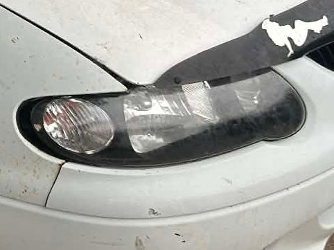 VUSS003 - VU SS HOLDEN COMMODORE UTILITY - Halogen Black Teardrop Headlight Driver's Side