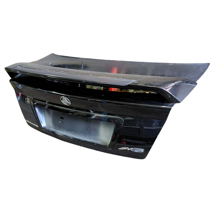 Ex012 - VZ Holden Commodore SV6 - Boot lid with Wing and boot garnish (Phantom Black #690F)