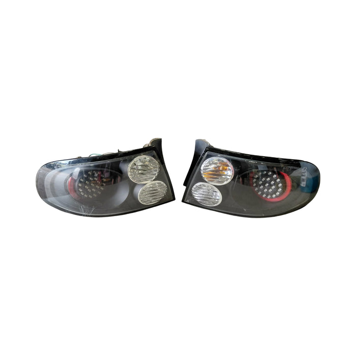 EX006 - VT Holden Commodore Sedan - Altezza Style Taillights BLACK LED (SET)