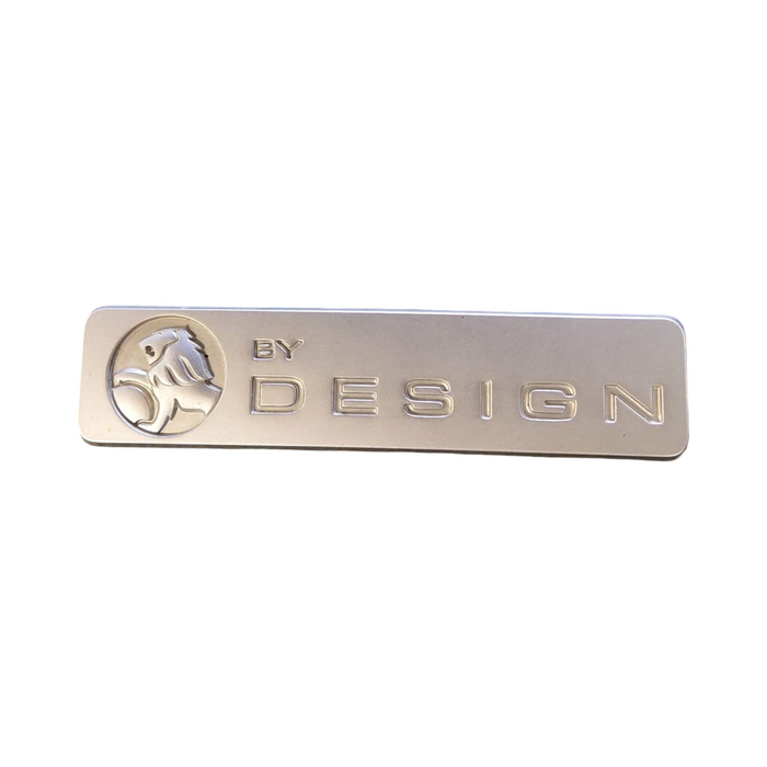 PIC002 - VX/VY/VZ SS Holden Adventra/Calais/Berlina/Executive - "BY DESIGN" Badge Genuine - CHROME 100mm
