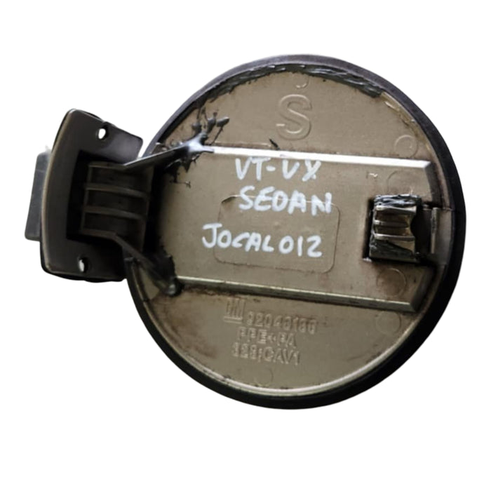 JOCAL - VX Holden Calais Sedan - Fuel Flap Tungsten Metallic # H114 GENUINE
