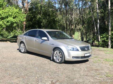 A031 - WM HOLDEN STATESMAN CAPRICE - FUEL FLAP - Evoke Mica Metallic #385n