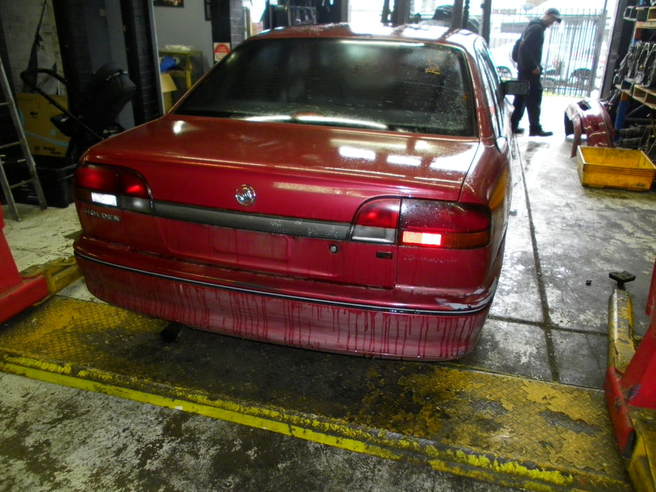 A072 - Vs HOLDEN COMMODORE Sedan - Fuel Flap - RED