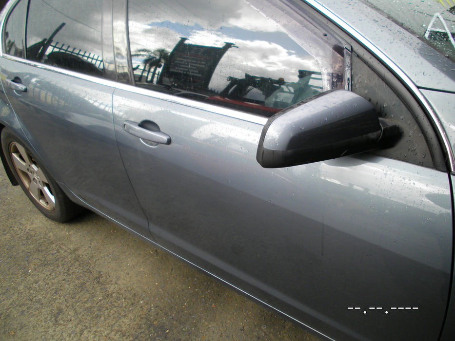 A064 - VE HOLDEN CALAIS  - Side Mirror Driver's Side - Odyssey Paint Code#276M