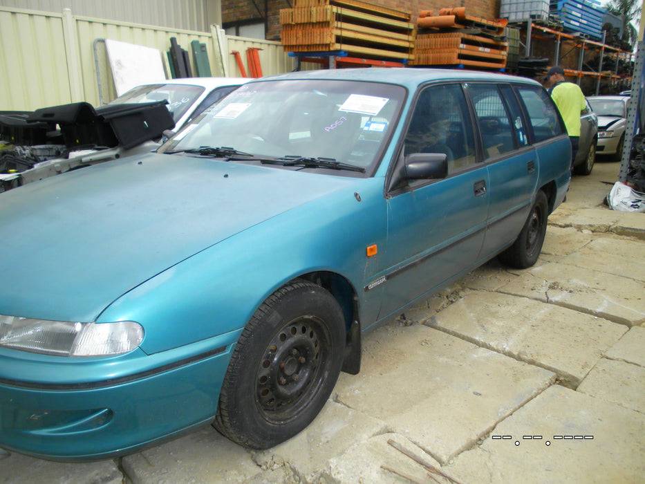 A057 - VR HOLDEN COMMODORE WAGON - Fuel Flap KIRA AQUA METALLIC #C059