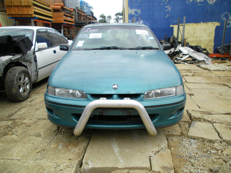 A057 - VR HOLDEN COMMODORE WAGON SI - Fuel Flap KIRA AQUA METALLIC #C059