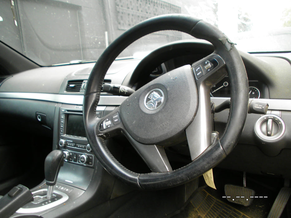 A060 - VE SERIES I Holden Calais Sedan - Refurbished Leather Steering Wheel with Silver Trim