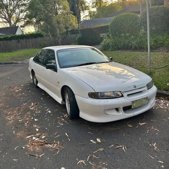 A190 - VS HOLDEN COMMODORE Executive - Fuel Flap HERON WHITE #679F