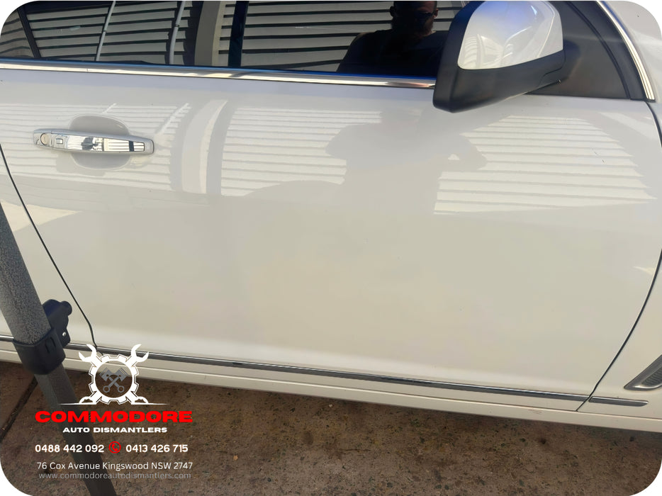 VF001 - VF Holden Calais V Sedan - Driver Front Door with window glass, reg and ext. Door handle Heron White #679F