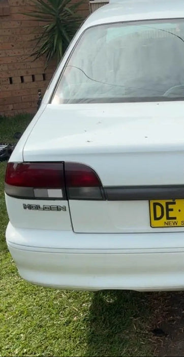 A305 - VR Holden Commodore SEDAN  - "HOLDEN" Rear Bar Badge GENUINE